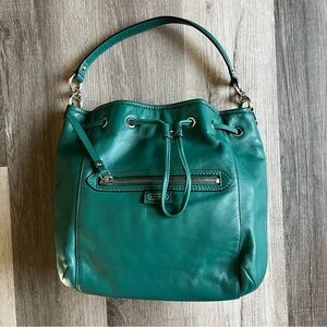 Teal coloured coach purse